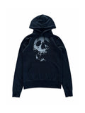 Black pullover hoodie with distressed skull graphic, front view